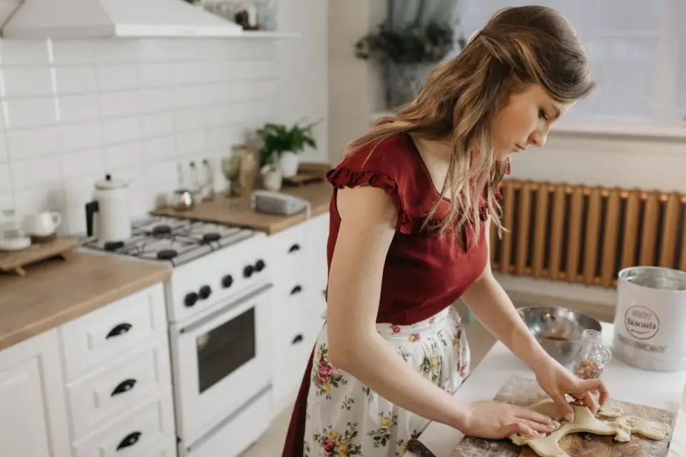 Dog owner preparing a meal
