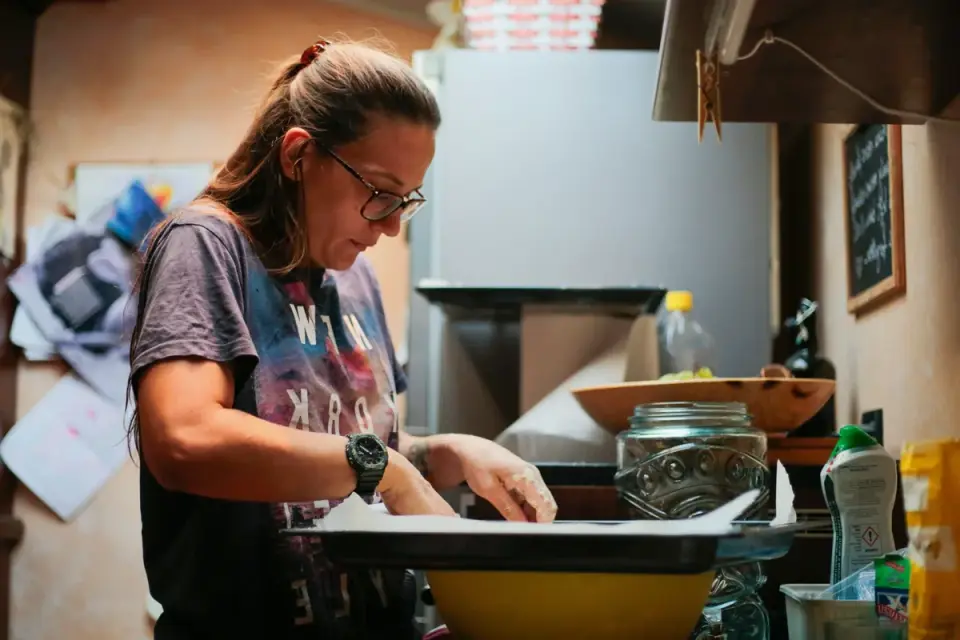 Dog owner preparing a meal