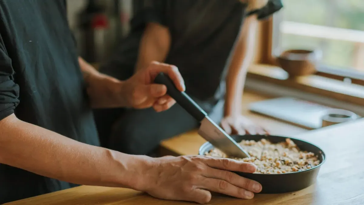Dog owner preparing a meal