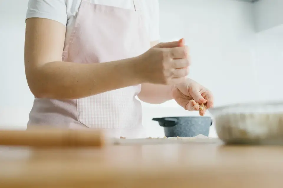 Dog owner preparing a meal